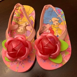Disney princess flip flops size 7/8 never worn